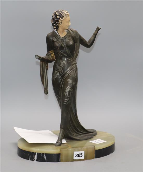 An Art Deco style resin and bronze figure, signed Menneville, overall height 41cm